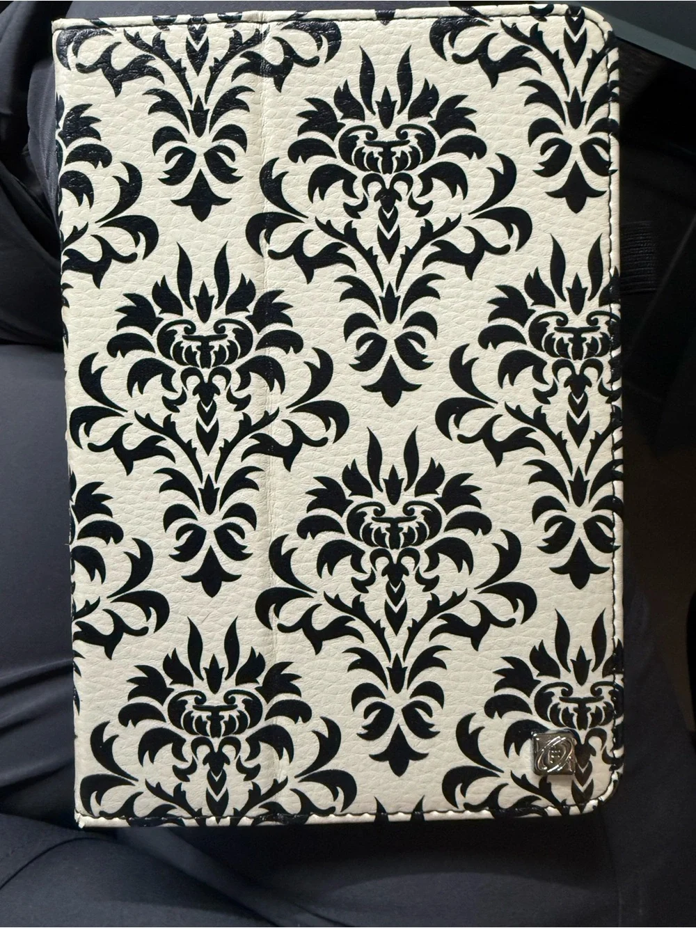 Amazon Kindle Fire tablet (generation 3) with black textured folio case